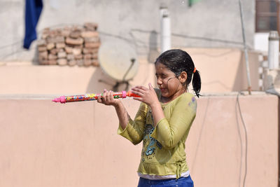 Girl playing during holi