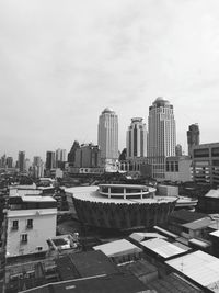 Buildings in city against sky