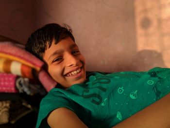 Portrait of smiling boy at home