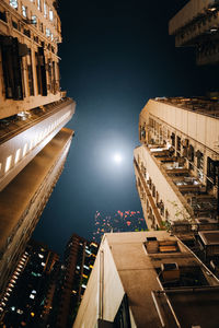 Illuminated buildings in city at night