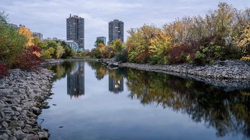 Reflection of buildings in lake