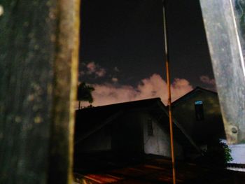 Low angle view of building against sky at sunset