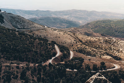 Aerial view of mountains against sky