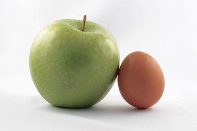 Close-up of fresh fruit on white background