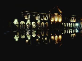 Illuminated building at night