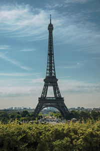 View of tower against cloudy sky