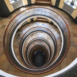 Directly below shot of spiral staircase in building