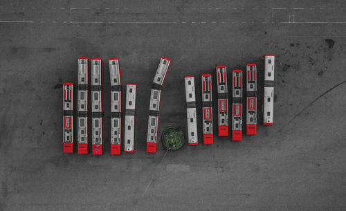 High angle view of red buses parked on street