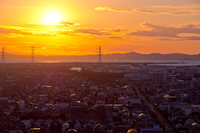 High angle view of townscape against sky during sunset