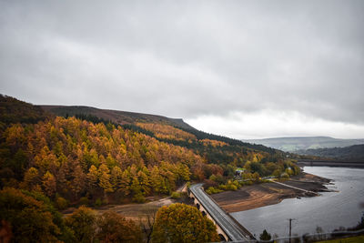 High angle view of trees and mountains against sky