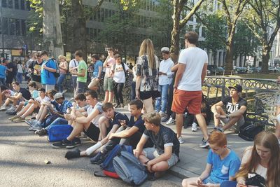 People sitting on street