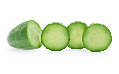 Close-up of fruits against white background