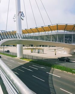 View of empty road against built structure