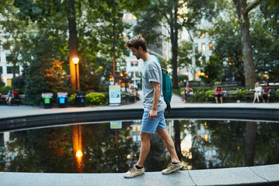 Full length of man walking in city