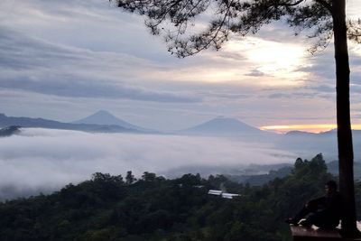 Scenic view of mountains against sky during sunset