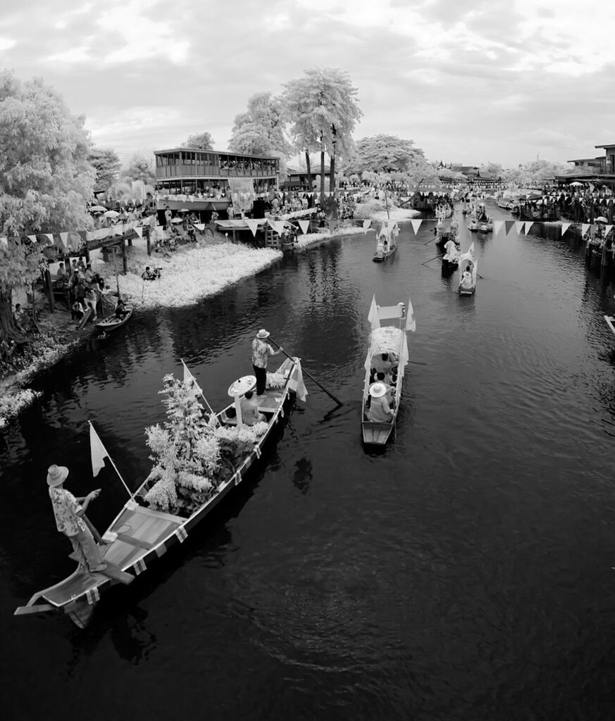 water, nautical vessel, transportation, mode of transport, boat, tree, architecture, building exterior, built structure, moored, river, waterfront, sky, cloud - sky, lake, high angle view, city, day, nature, reflection