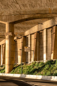 Low angle view of bridge in city