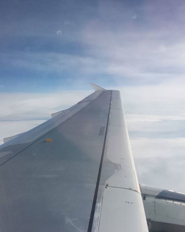 sky, cloud - sky, transportation, low angle view, cloud, built structure, cloudy, mode of transport, part of, architecture, cropped, day, blue, outdoors, travel, no people, airplane, white color, building exterior, modern