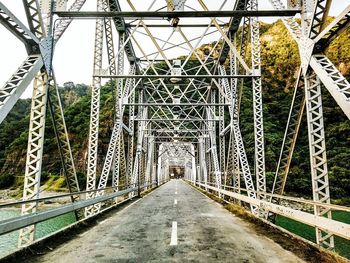 Footbridge against bridge