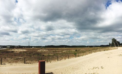 Scenic view of land against sky