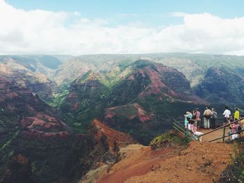 Tourists on an observation point looking at view