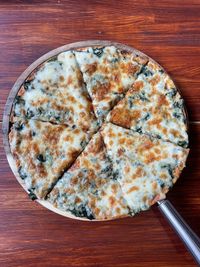 High angle view of pizza on table