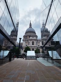 View of buildings in city against sky