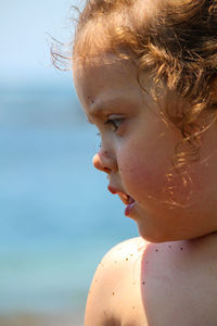 Close-up of shirtless girl