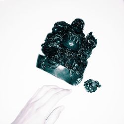 Close-up of paper over white background