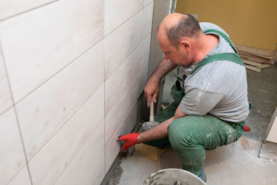 High angle view of man working at home