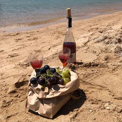 View of drink on table at beach