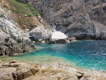 Scenic view of rocks in sea