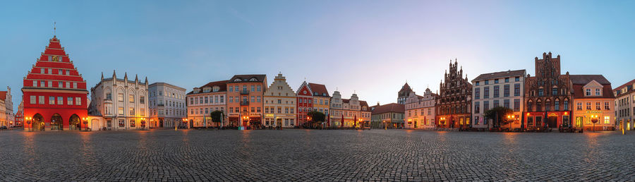 Illuminated buildings at waterfront