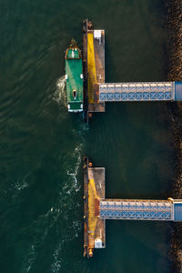 High angle view of metal structure in lake