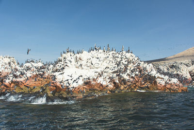Scenic view of sea against cloudy sky