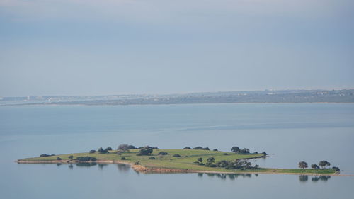 Panoramic view of sea against clear sky