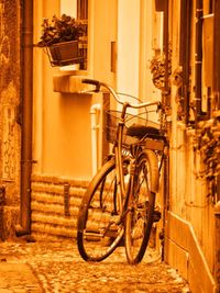 Bicycle in front of built structure