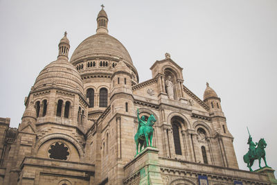 Low angle view of basilique du sacre coeur against clear sky