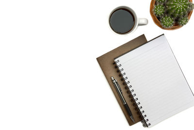 High angle view of pen on table against white background