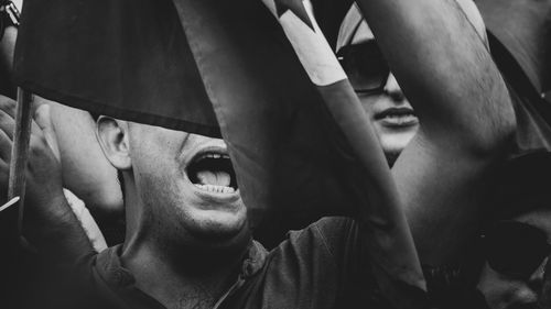 Close-up portrait of  young man screaming