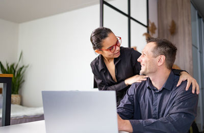 Side view of businessman working at office