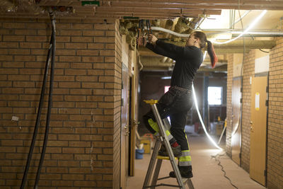 Woman renovating house