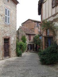 Narrow alley along buildings