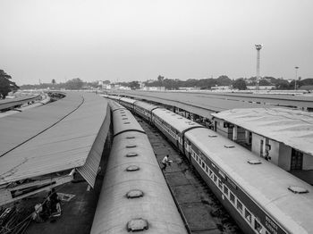Railroad tracks against sky. an indian train station in mysore.