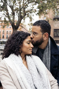 Young couple kissing outdoors