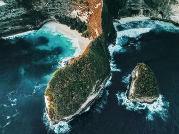 High angle view of rock formation in sea