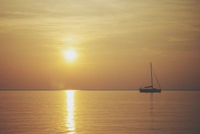 Scenic view of sea at sunset