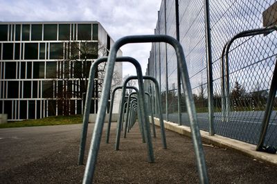 Metal structure in playground against sky