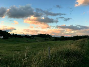 Scenic view of landscape against sky during sunset