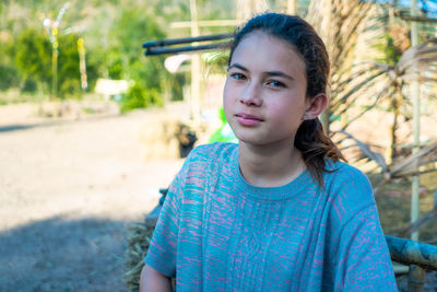 Young woman standing outdoors